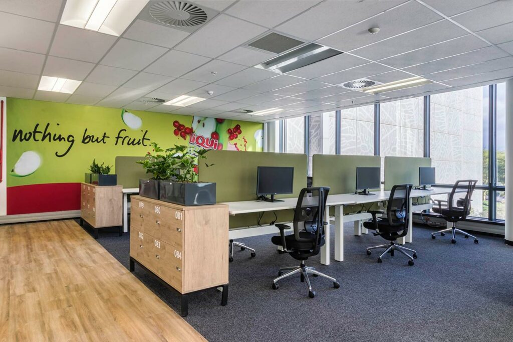 Office interior design by Trend Group — branded reception and workspace.