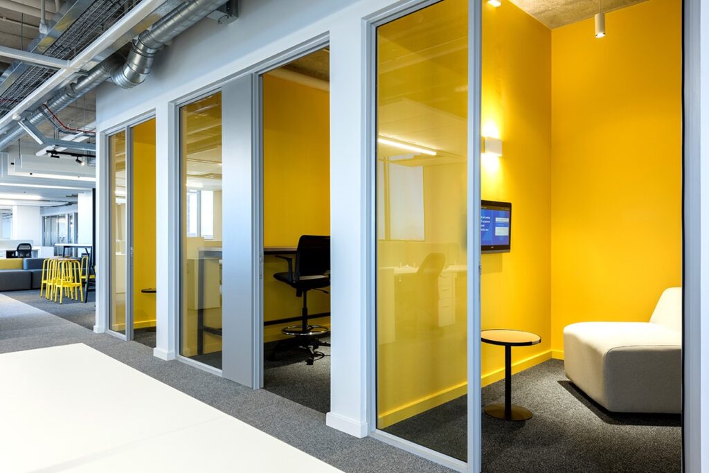 2U commercial multi-story building colorful flexible work spaces and glass office meeting areas build