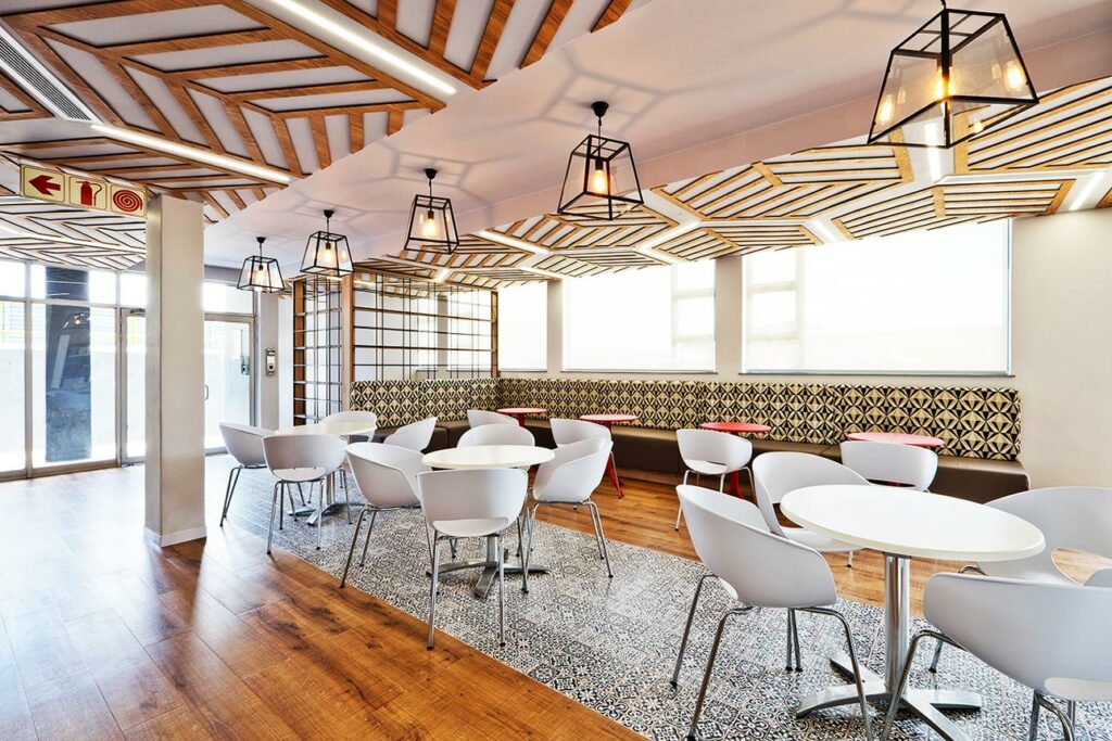 Coca-Cola commercial office canteen interior design and build with wooden ceiling design