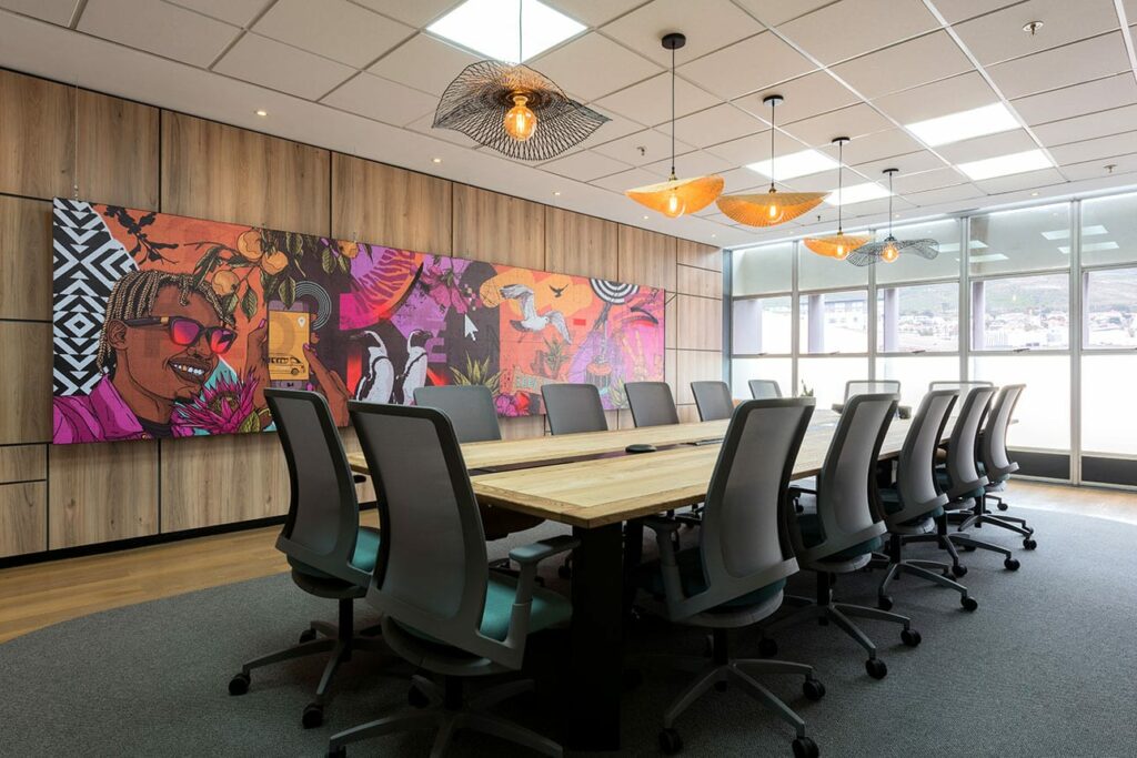 Boardroom with long table and ergonomic chairs for Merchants office in Cape Town