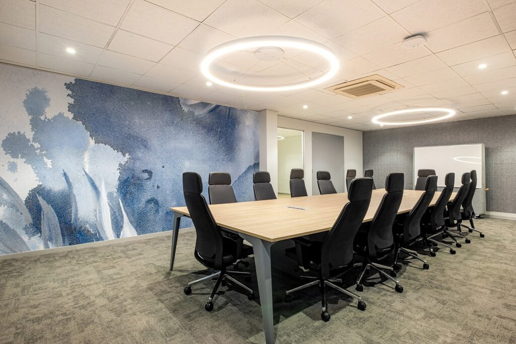 Sanlam office boardroom interior design with modern table and chair interiors and lighting