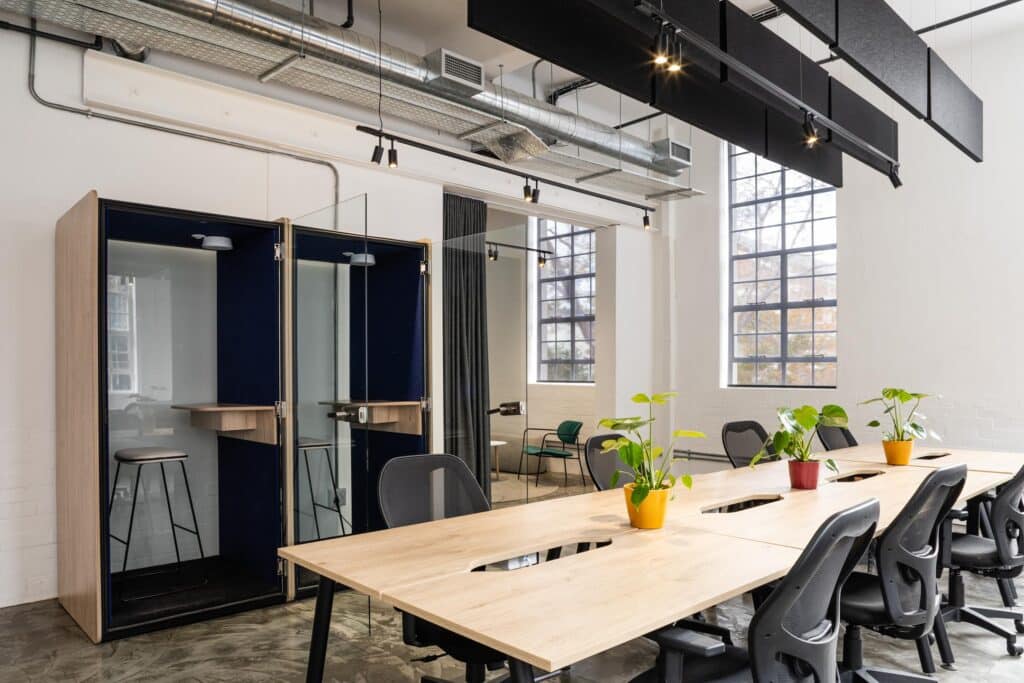 Cost Certified flexible office space with private office booths and desks and ergonomic chairs