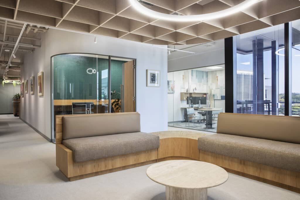 European Investment Bank international office interior design and build with glass offices and booth seating