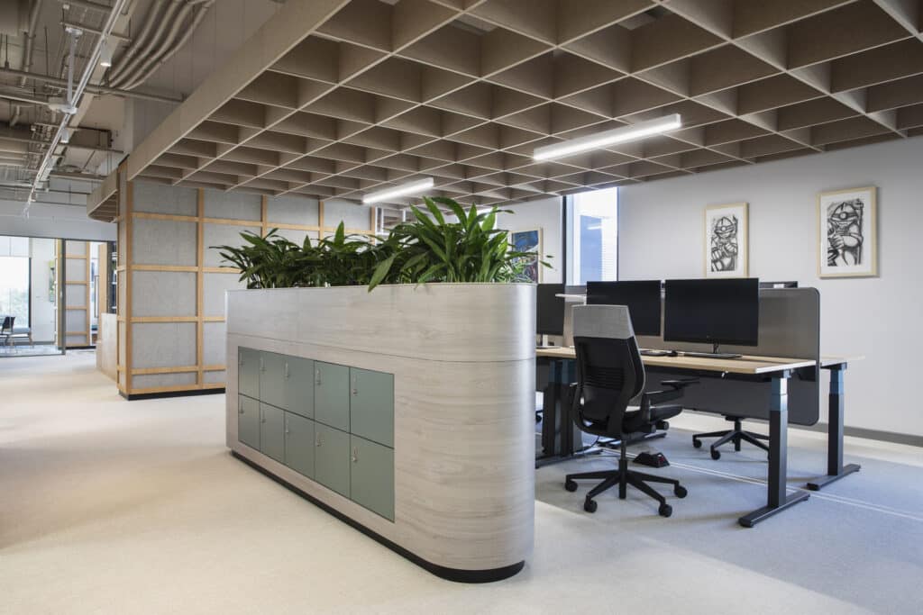 European Investment Bank international commercial office interior design with modern desks and furniture and planters