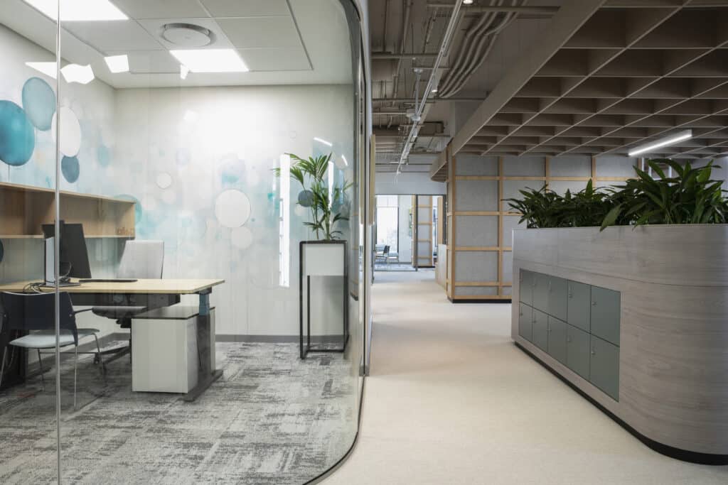 European Investment Bank sophisticated commercial office design and build with private glass office and planters