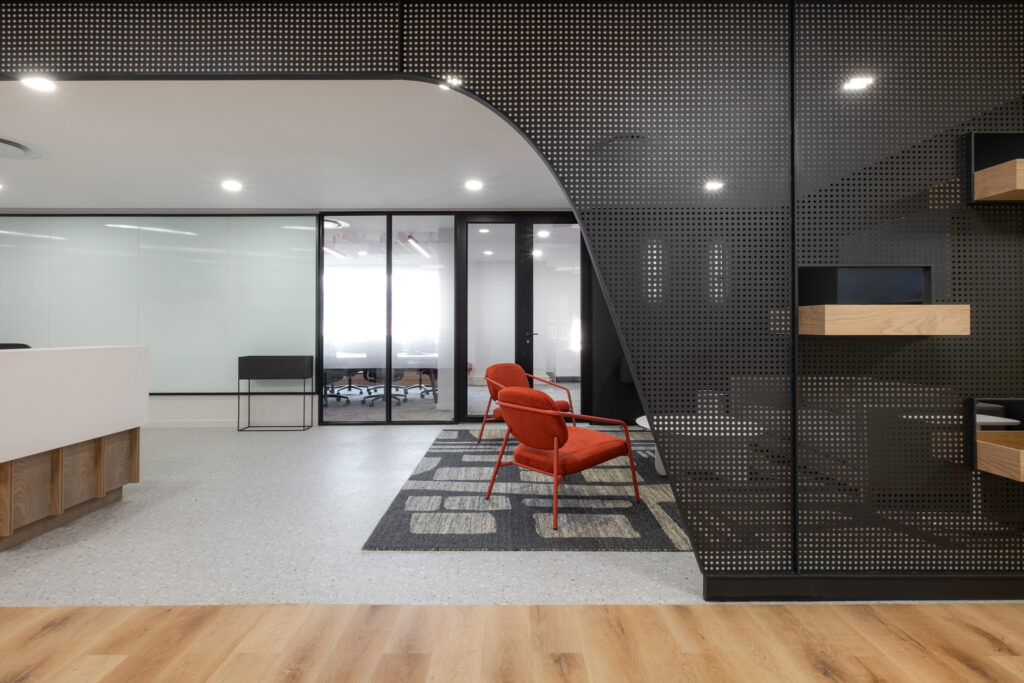 Reception area with curved wall feature and seating area for Automation Client