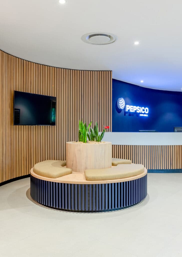 Pepsico commercial office reception area interior design using sustainable wooden materials