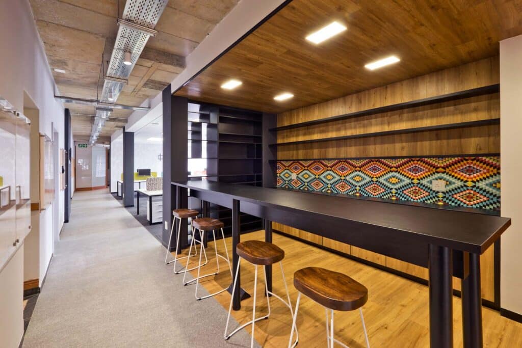 BBC News international commercial open plan office design modern seating area