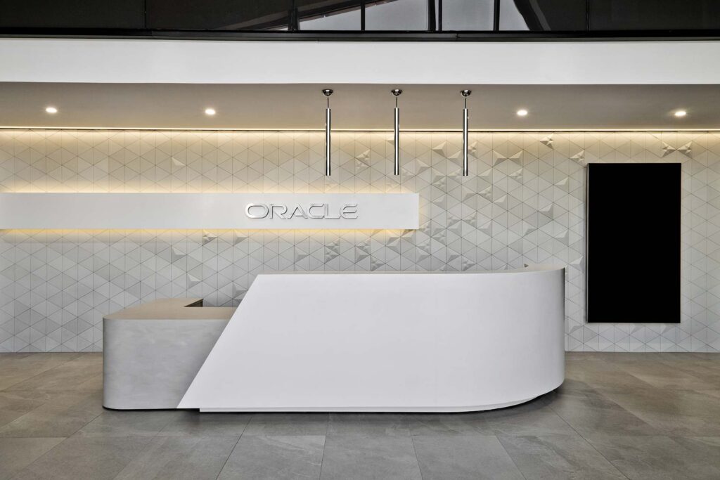 Oracle international commercial office interiors design with white reception area