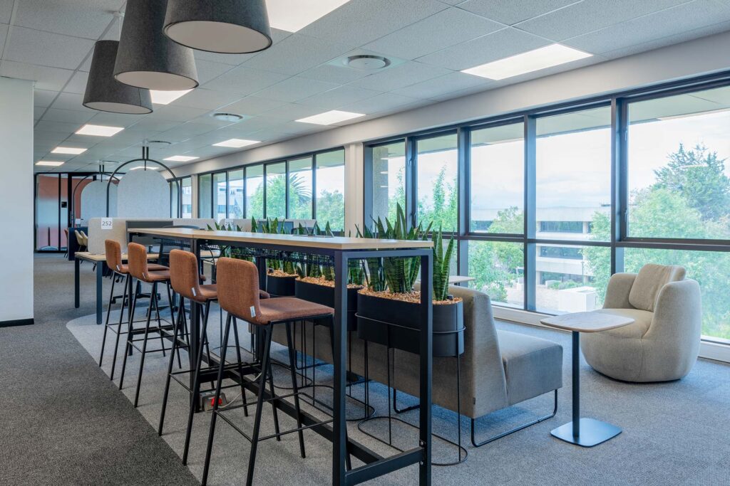 Pepsico international office interior design with barstools and high desk