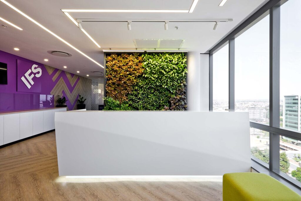 IFS commercial office interior with green wall biophilic design