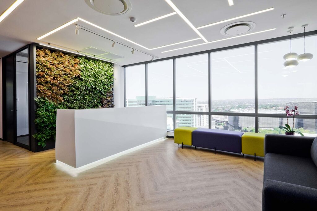 IFS commercial office reception seating modern and green wall interior
