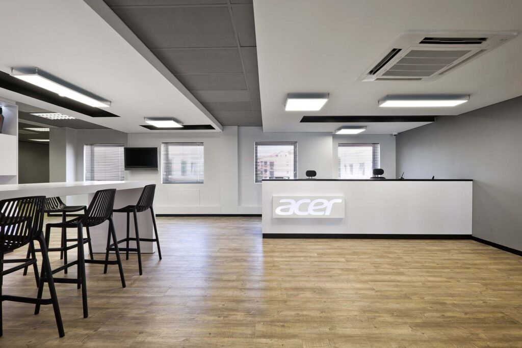Acer global office reception area desk and seating area layout and design