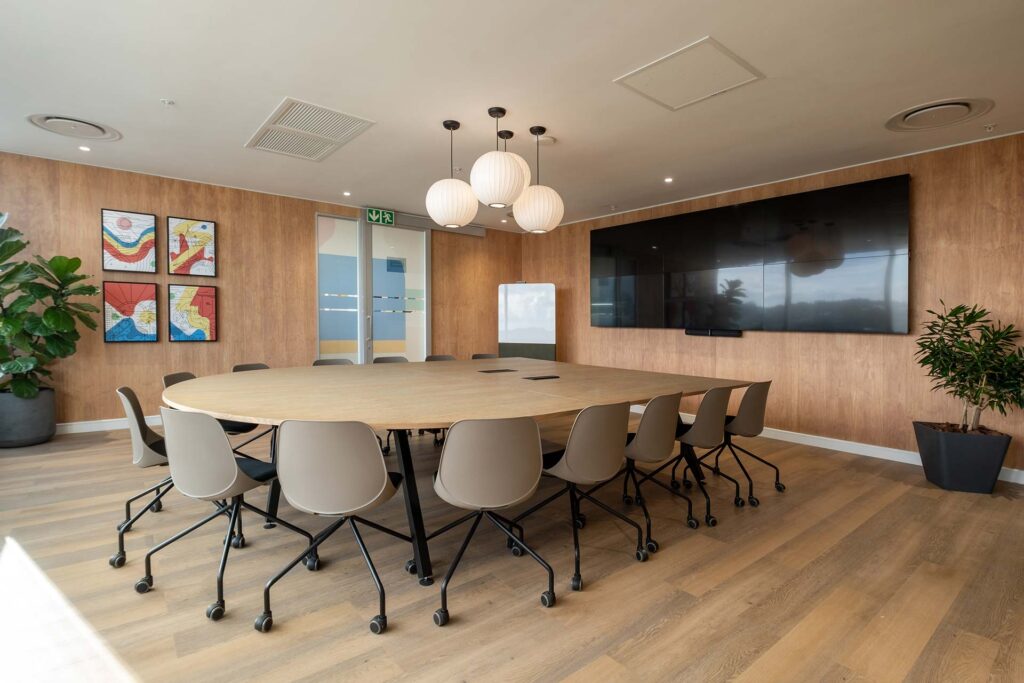 P&G commercial boardroom interiors design sustainable materials and multiple screens technology