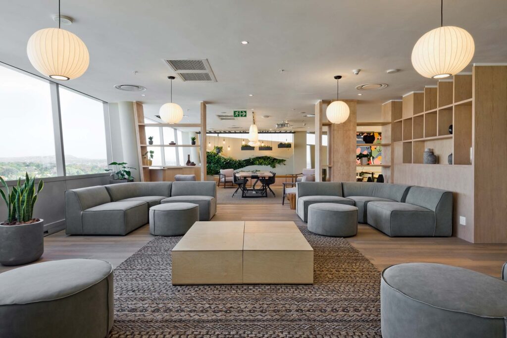 P&G international office interior design with modern seating and green wall fit-out