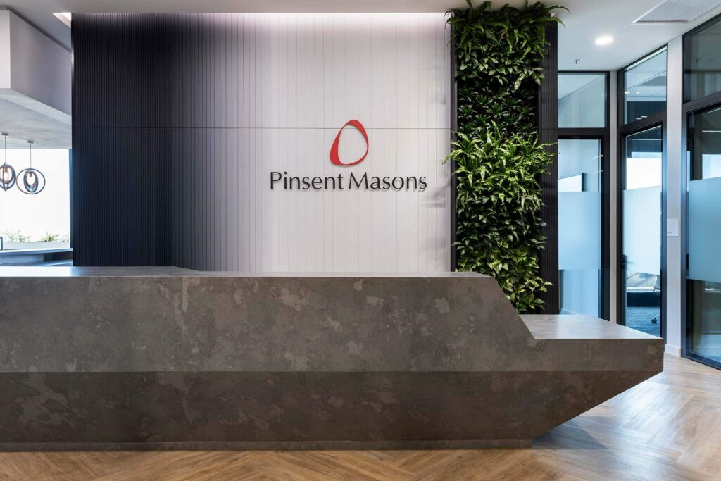 Pinsent Masons international office reception area with modern interior design and green wall build