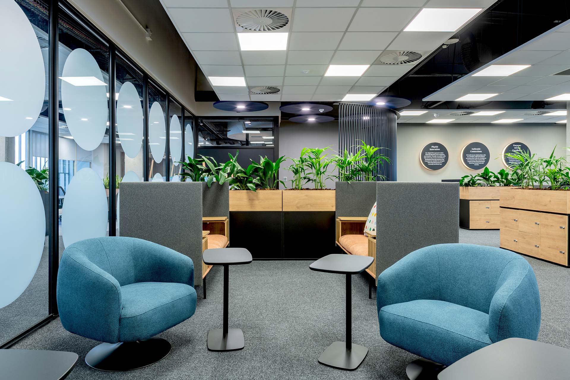 Office interior design by Trend Group — branded reception and workspace.