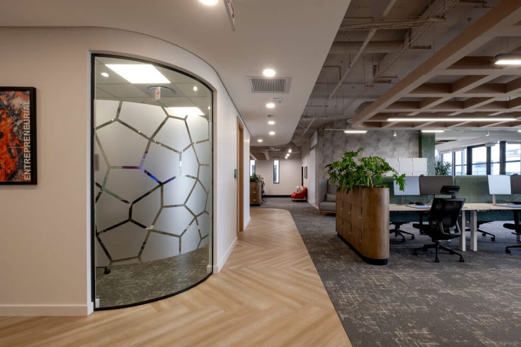 World class offices with open plan layout and frosted glass windows for meeting rooms