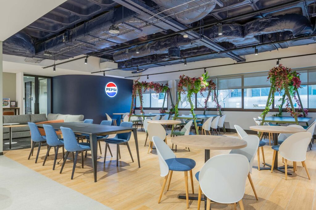 Calm commercial workspace environment with greenery for employee satisfaction end enjoyment at lunch