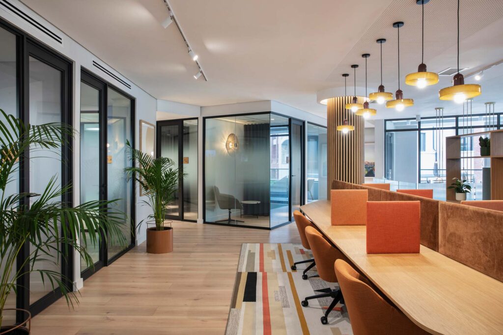 Commercial office interior design with desk partitions for focused employees and sound control