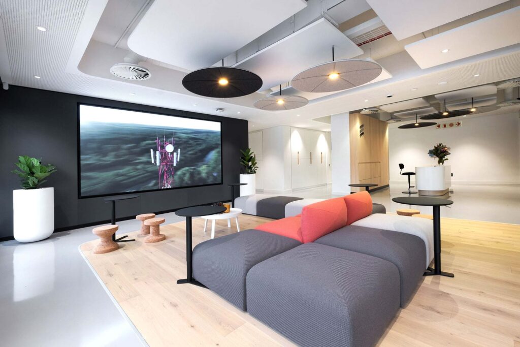 International global office reception area with smart automation and technology integrated into their workspaces