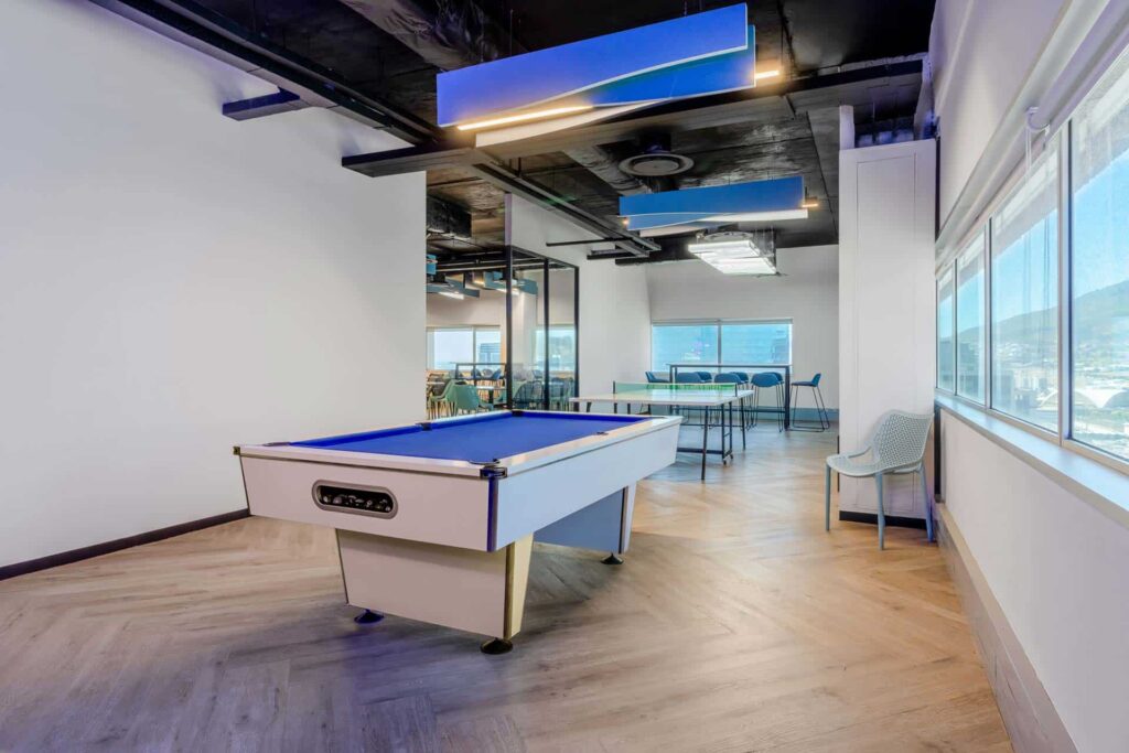 Boardroom table and blue ceiling detail for - future-ready workspace