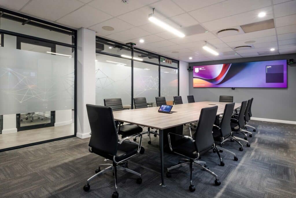 High-tech boardroom with smart technology and onlin tv setup for remote meetings