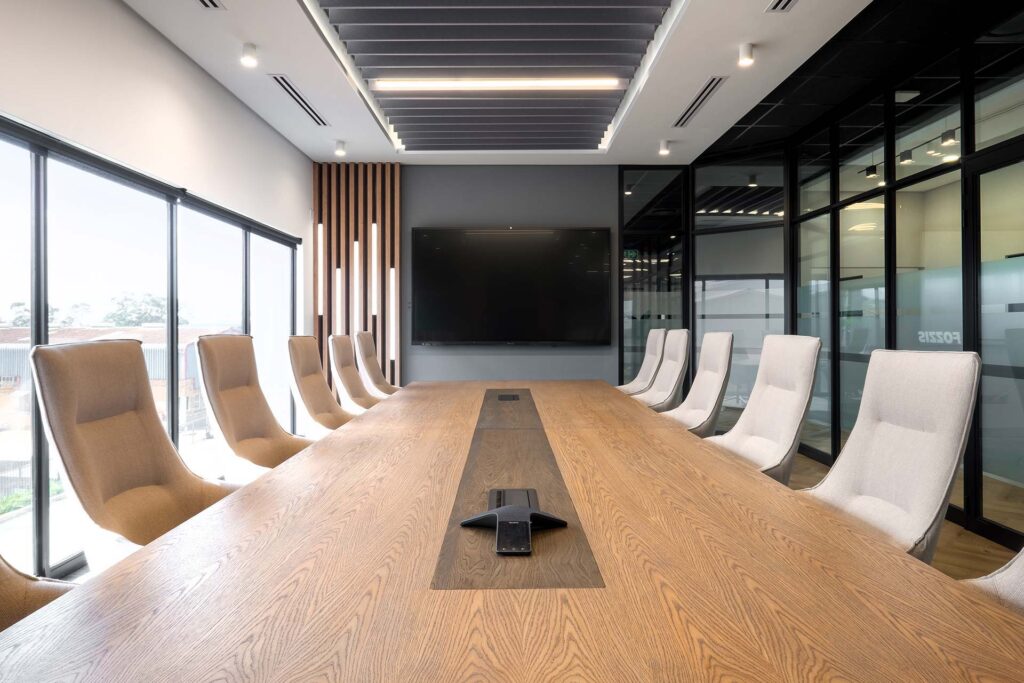 Commercial office boardroom fit-out with high end smart technology AV system and tv for online collaboration